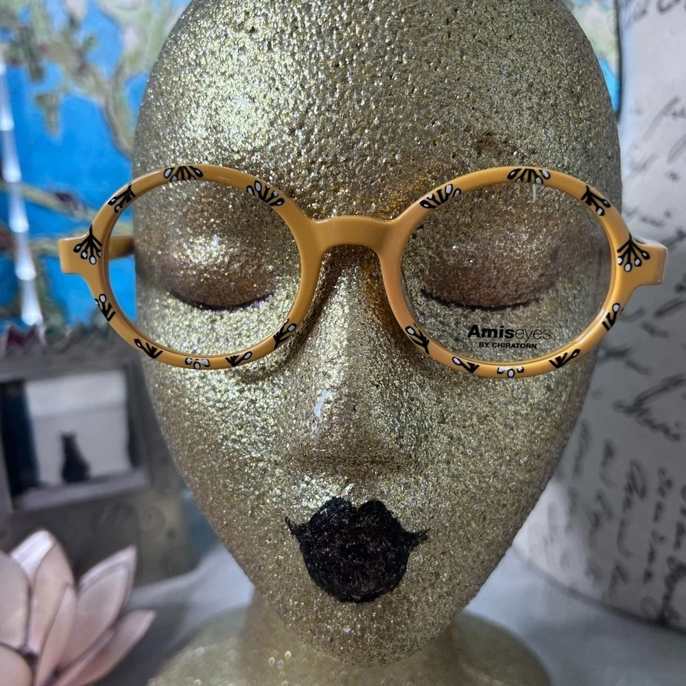 Amiseyes yellow and white spectacles.